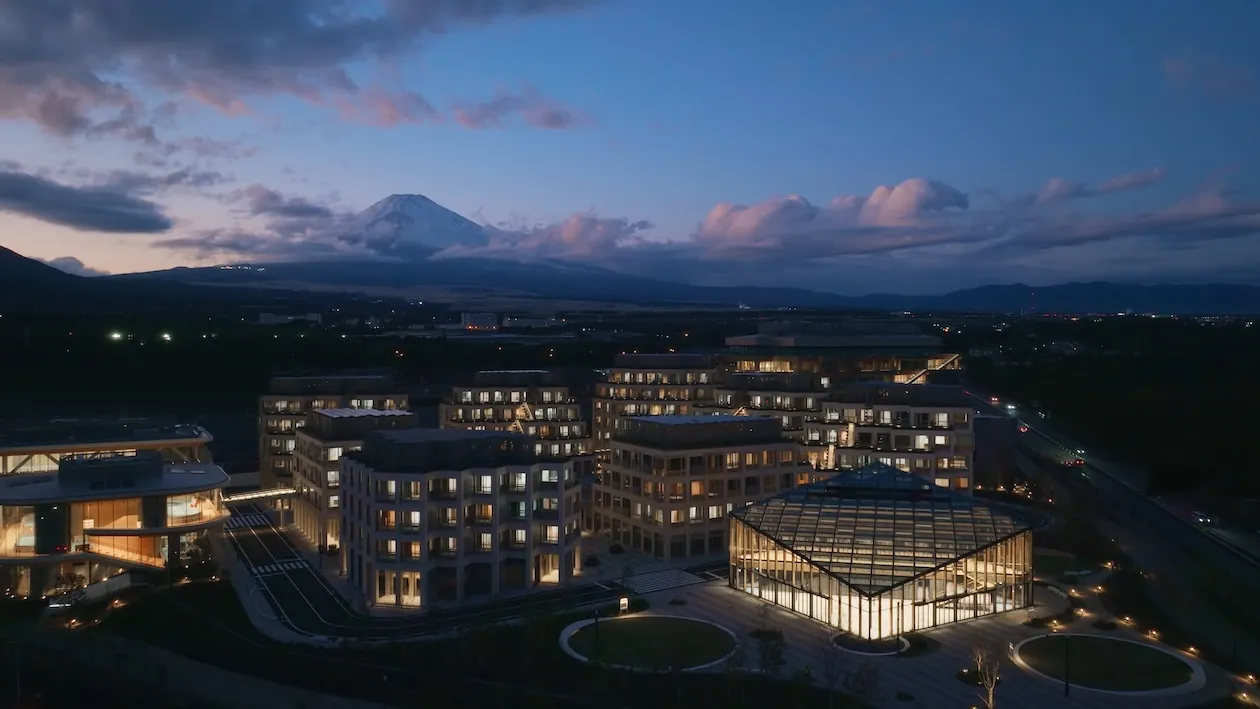 Zoomed out view of Woven City with Mt. Fuji in the background