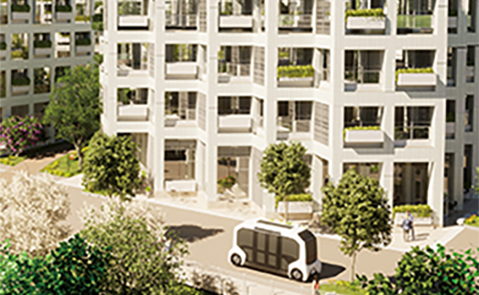 Image from the Woven City digital twin featuring the buildings and an e-Palette